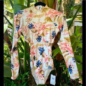 Ripcurl one piece surf long sleeve swimsuit. Size small.  NWT